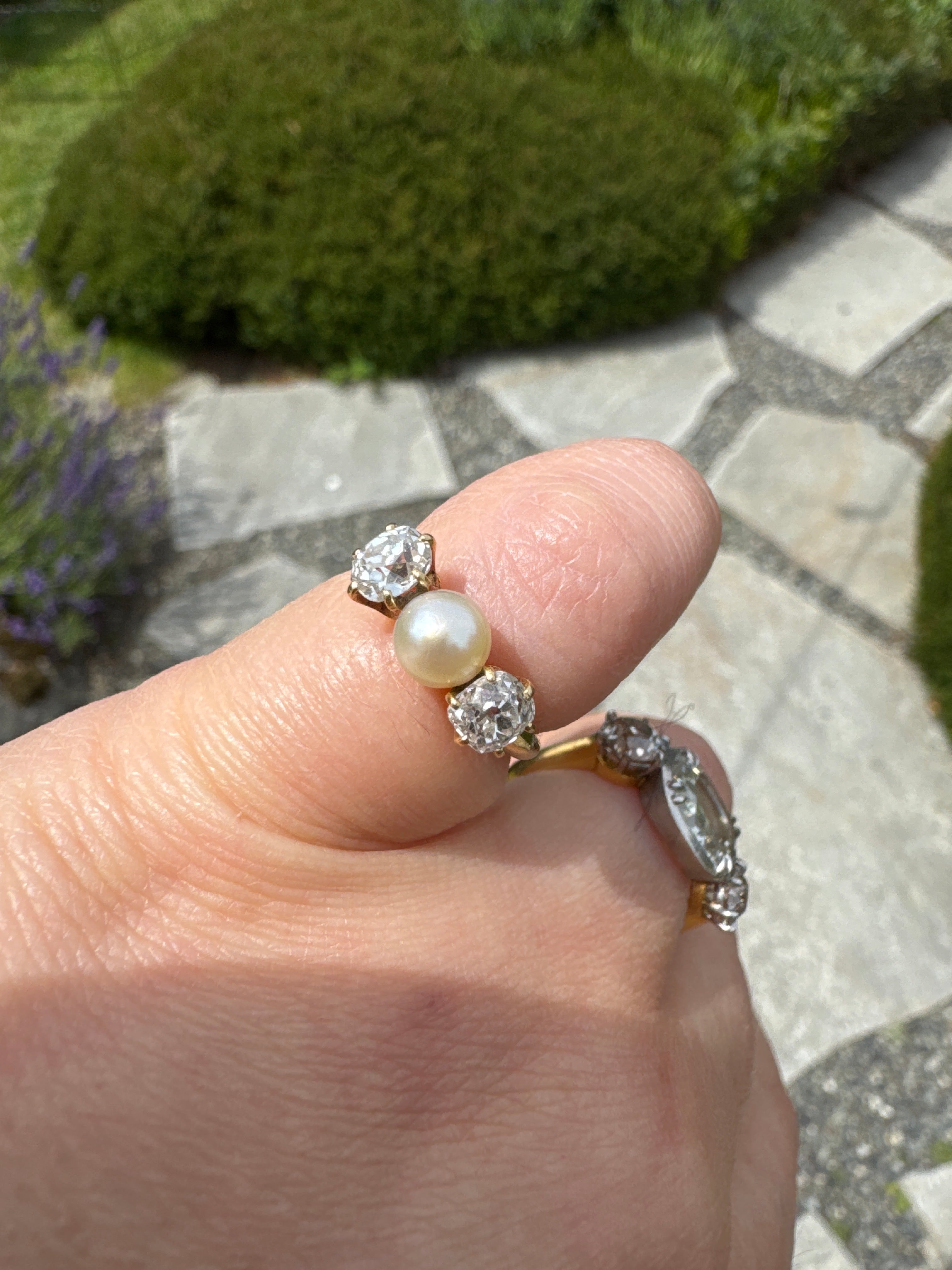 Three stone pearl mine cut diamond ring