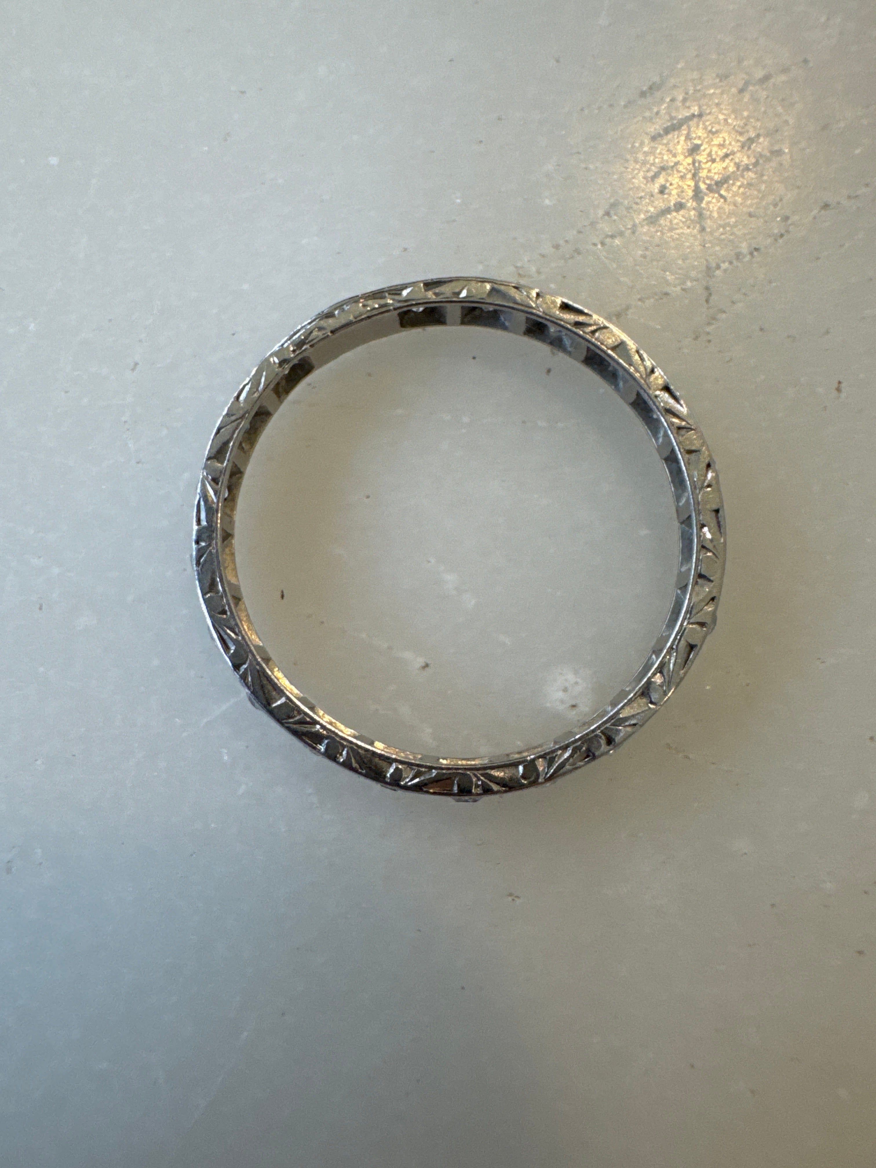 Engraved art deco eternity band platinum