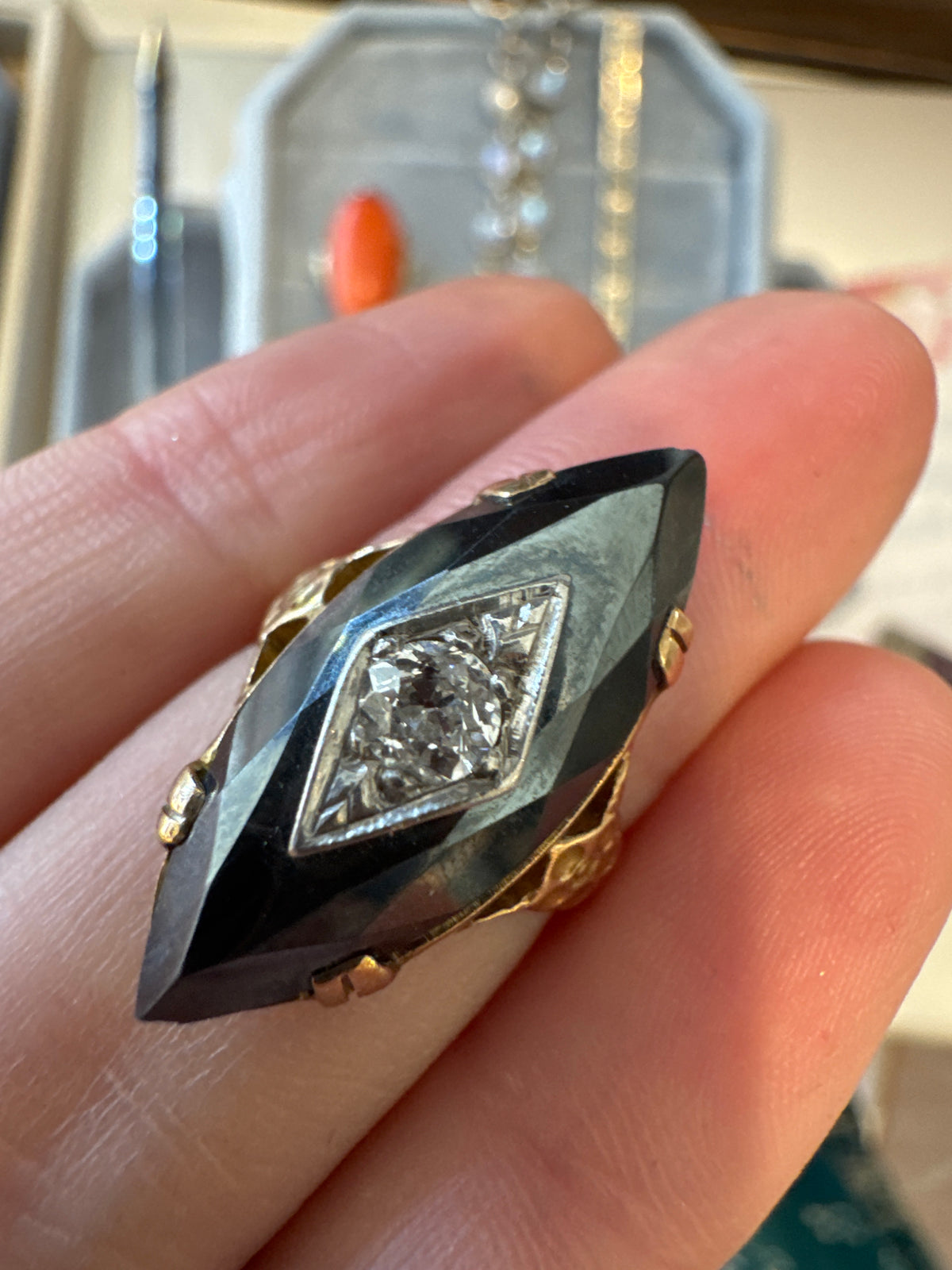 Deco hematite marquise ring with diamond inset
