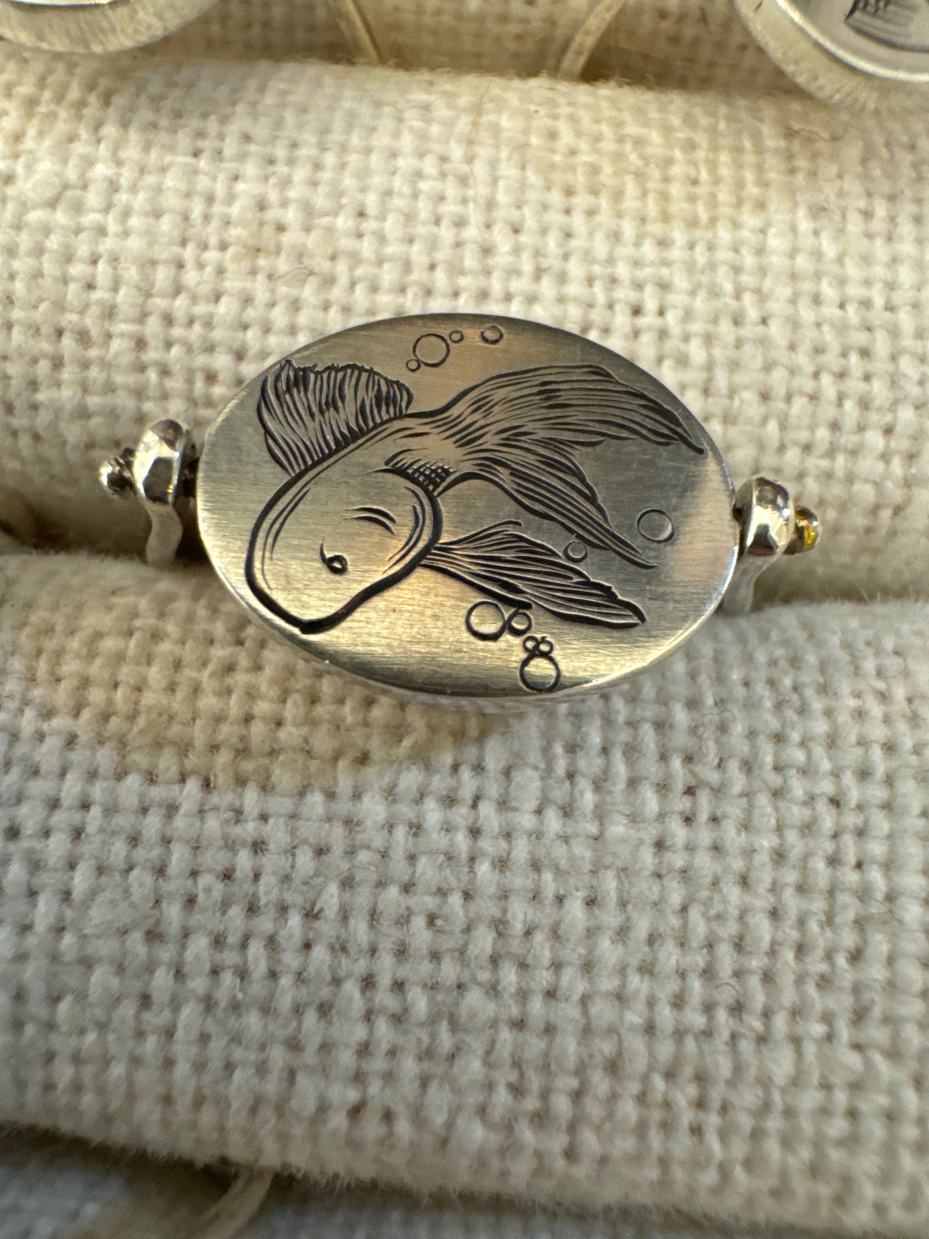 Laine engraved silver flip rings