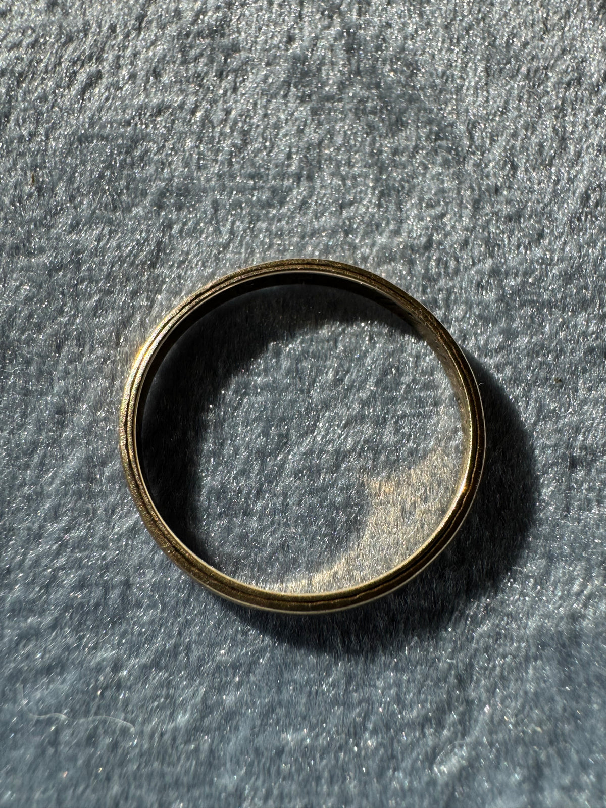 Petite gold art deco band engraved inside