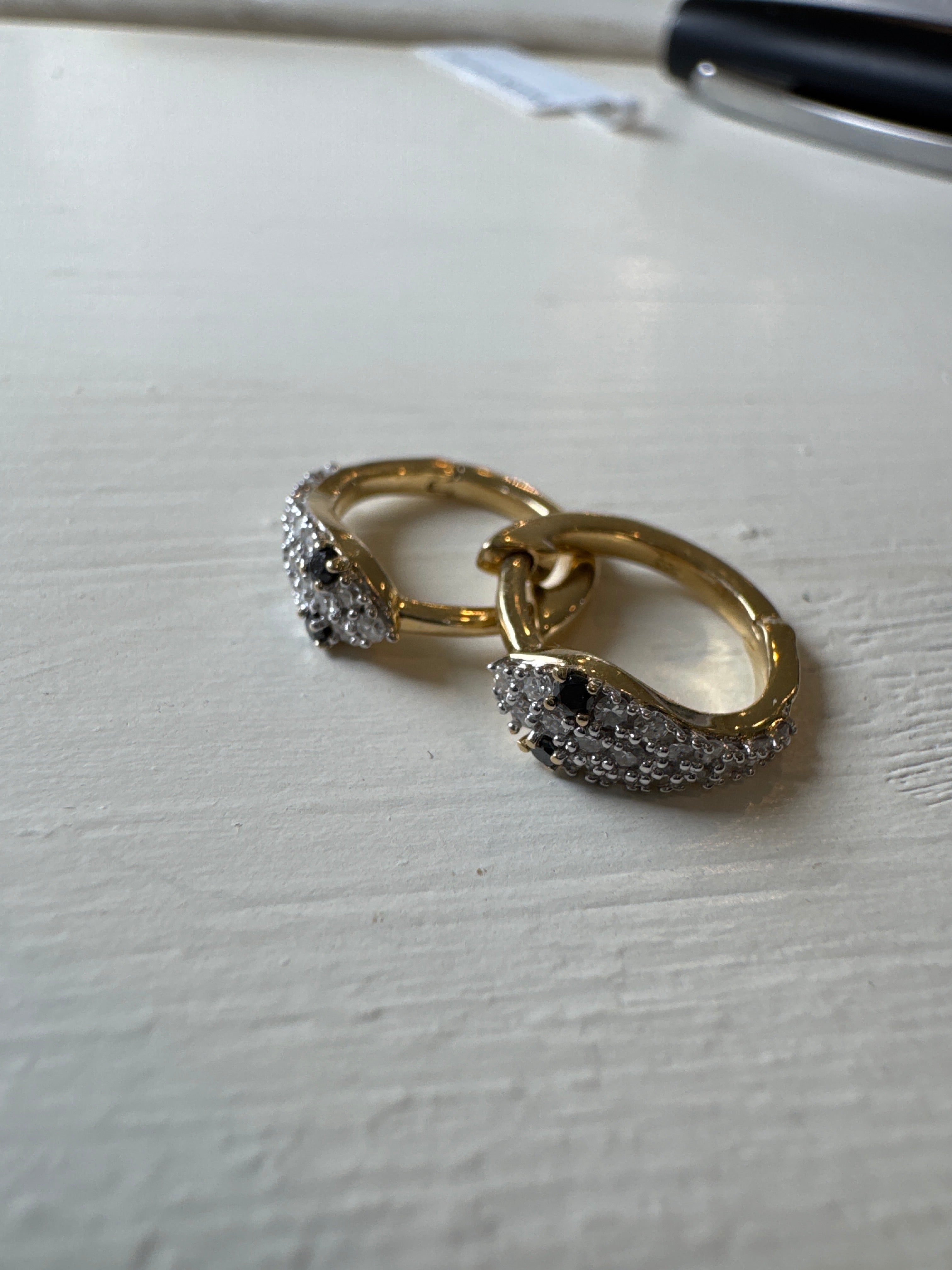 Snake hoop Huggie diamond earrings 14k black diamond eyes 46201