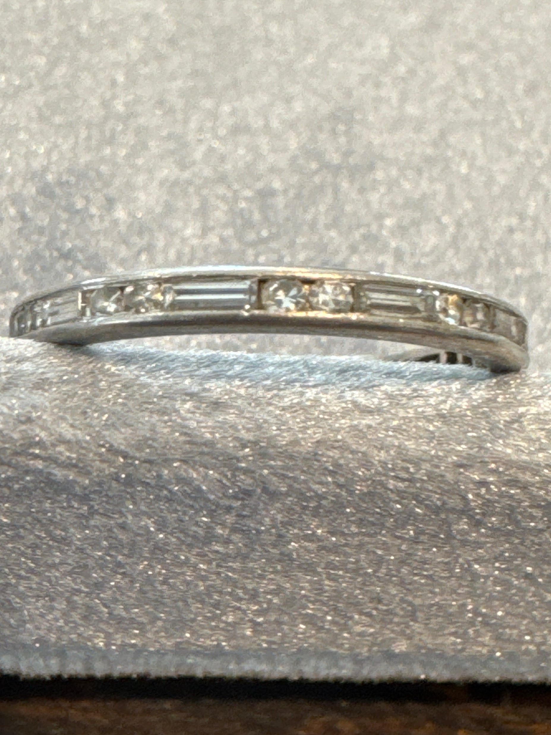 Baguette / step cut & round cut diamond eternity band