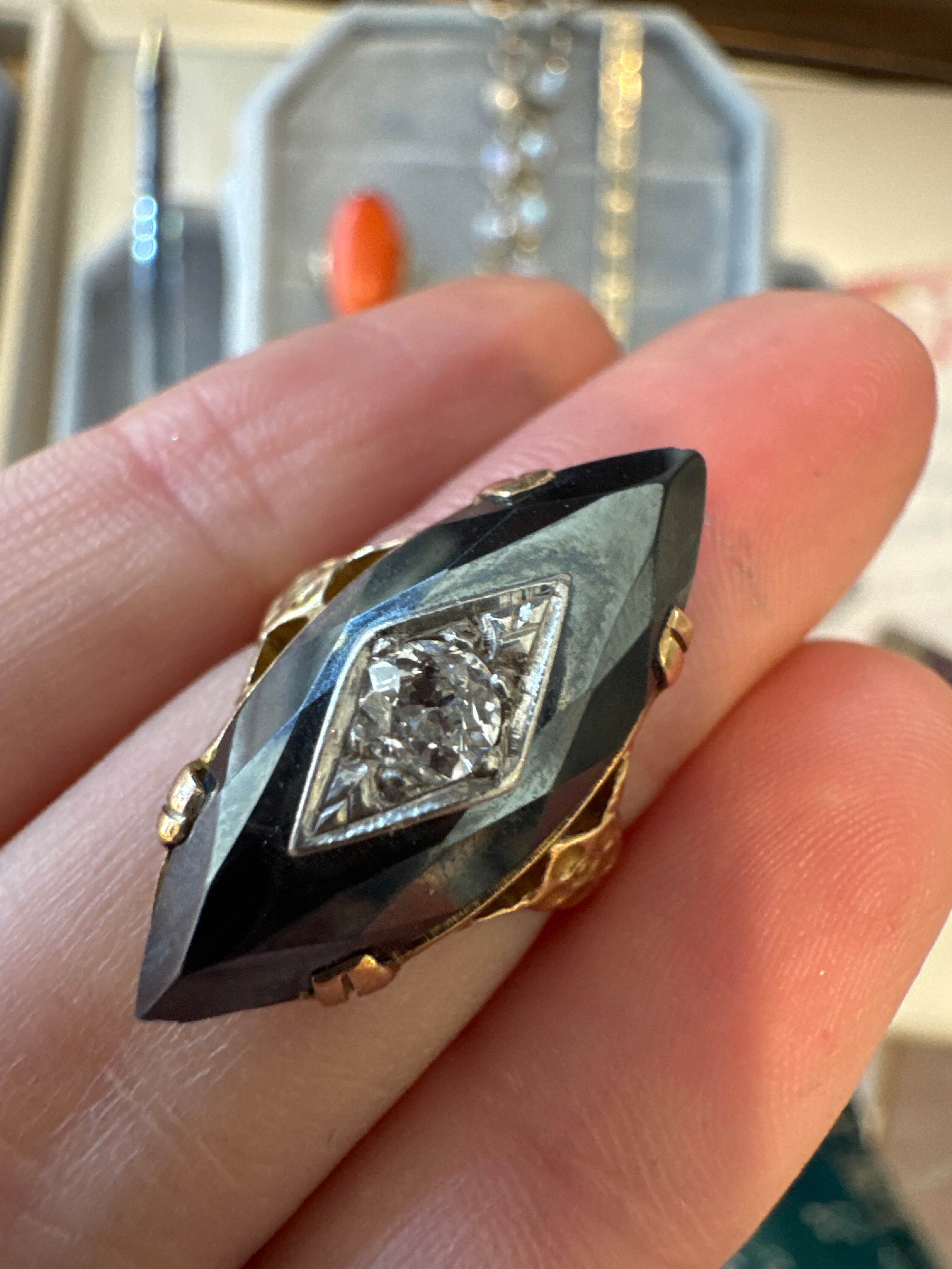 Deco hematite marquise ring with diamond inset